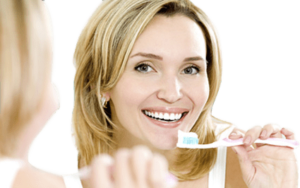 brushing teeth woman