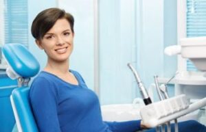 dental office with woman with great teeth